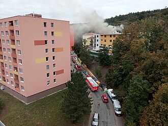 Požár bytového domu na ulici Ronovská v roce 2021